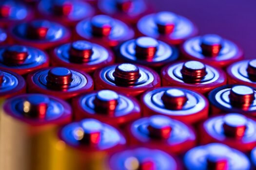 Closeup Of Positive Ends Of Discharged Batteries Aa Sizes, Macro Shot, Selective Focus. Used Battery