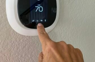 A Homeowner And Woman Adjusts The Settings And Temperature On Her Ecobee Smart Thermostat