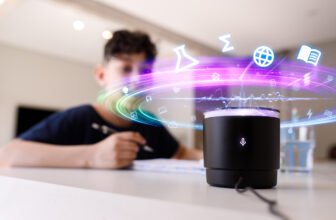 Young Man Speaking To A Voice Assistant