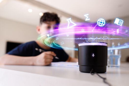 Young Man Speaking To A Voice Assistant